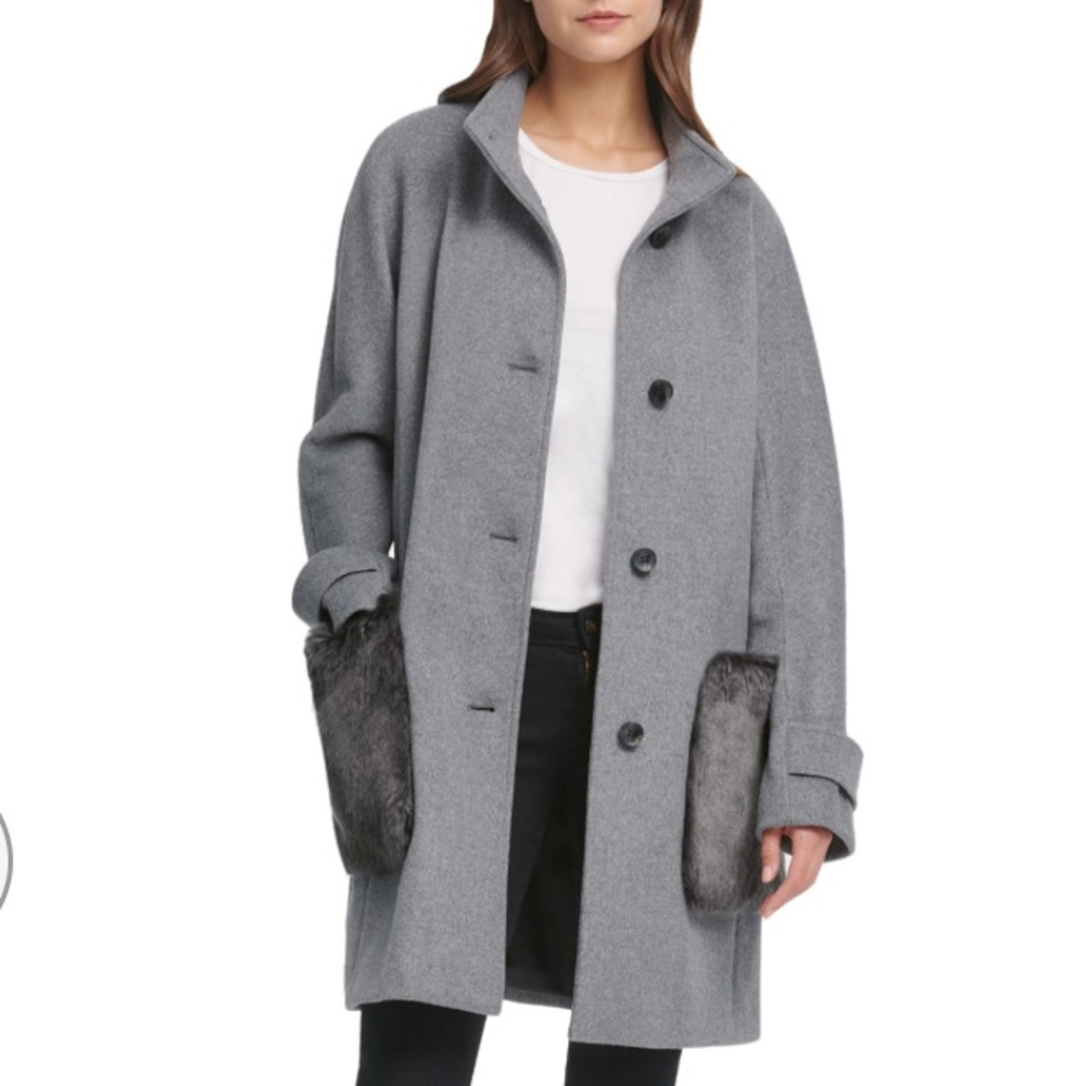 Gorgeous coat by DKNY with fur pockets. Offers welcome